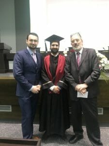 Ben Ambrose and Dr Martin Hyde with Dr Azhar Khan. Dr Khan graduated top of the class in 2019